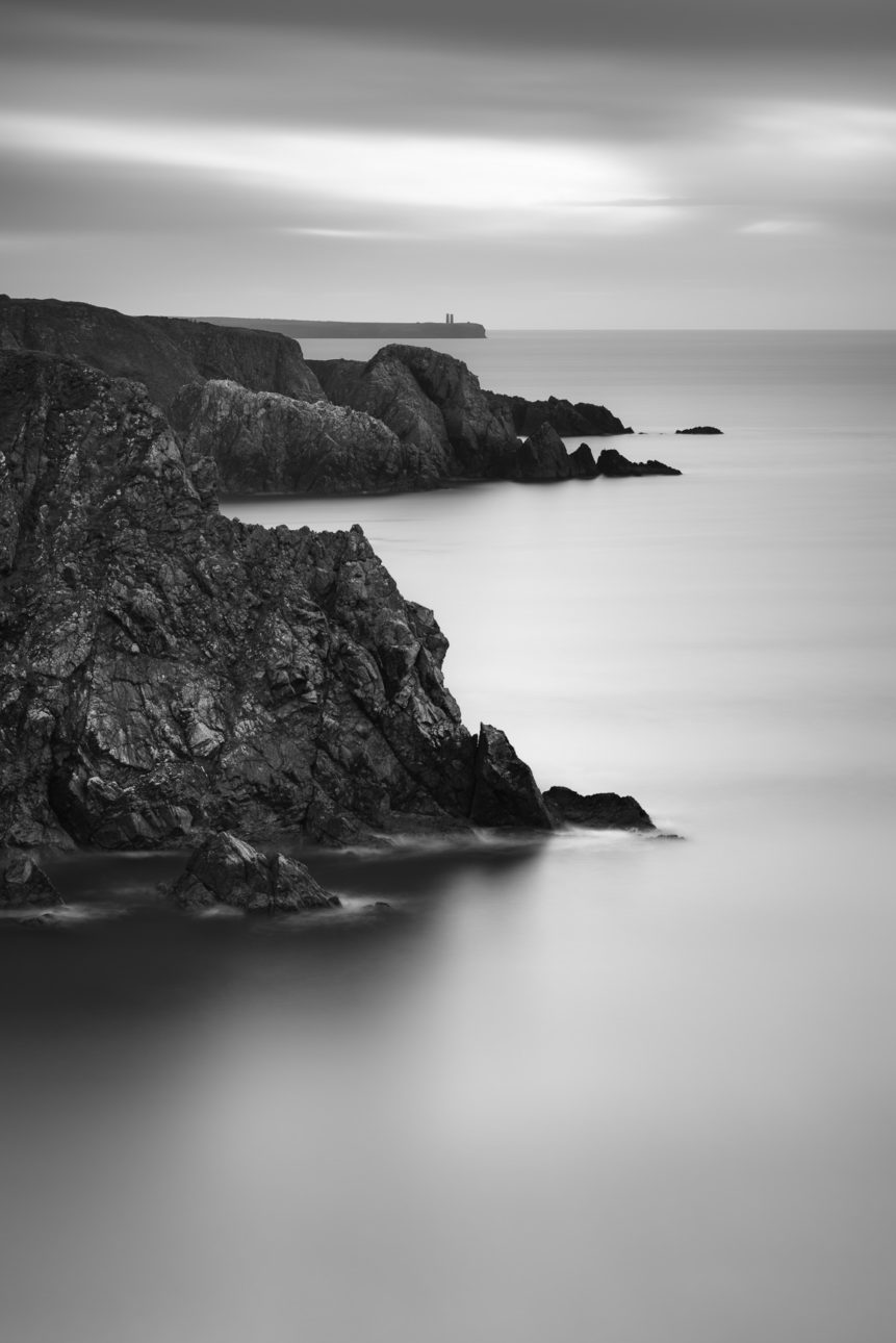 An Irish coastal landscape in black & white showing the cliffs near Garrarus beach in County Waterford, Ireland. Rough - Copyright Johan Peijnenburg - NiO Photography