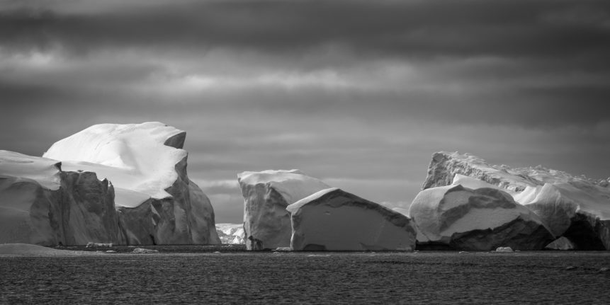 The icebergs of Disko Bay in the Ilulissat Icefjord in Greenland's Disko Bay, close to sunset. Ice Passage - Copyright Johan Peijnenburg - NiO Photography