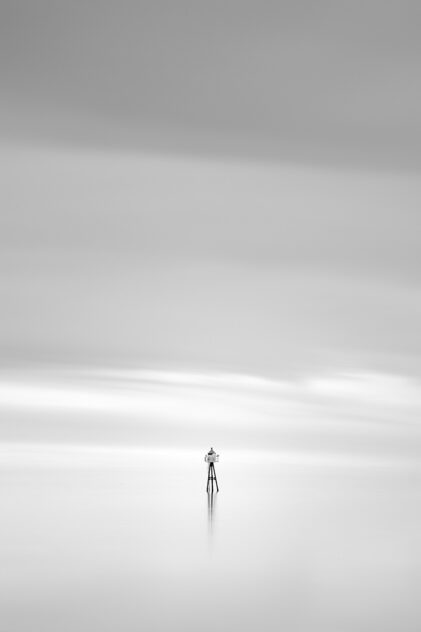 Two birds overlooking a calm Norwegian Sea near Lofoten from a small lighthouse, in a dreamy and soothing minimalist coastal landscape in black & white. Soothing - Copyright Johan Peijnenburg - NiO Photography