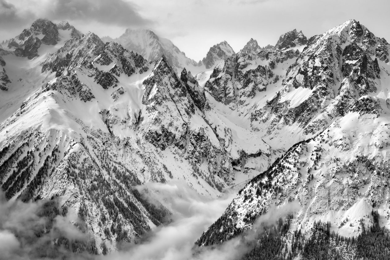 Birds-eye view of the alps of the Mont Blanc massif in winter, in a mountain landscape in B&W. Come fly with me - Copyright Johan Peijnenburg - NiO Photography