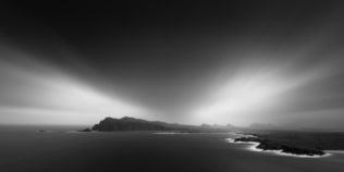 An Irish landscape in black & white, showing the Three Sisters (An Triúr Deirféar) and the North Atlantic Ocean as seen from Sybil Head on the Dingle Peninsula in Kerry. The Three Sisters - Copyright Johan Peijnenburg - NiO Photography